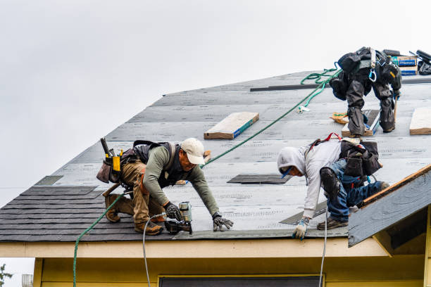Professional Gutter Installation technician working in Ferguson, NC